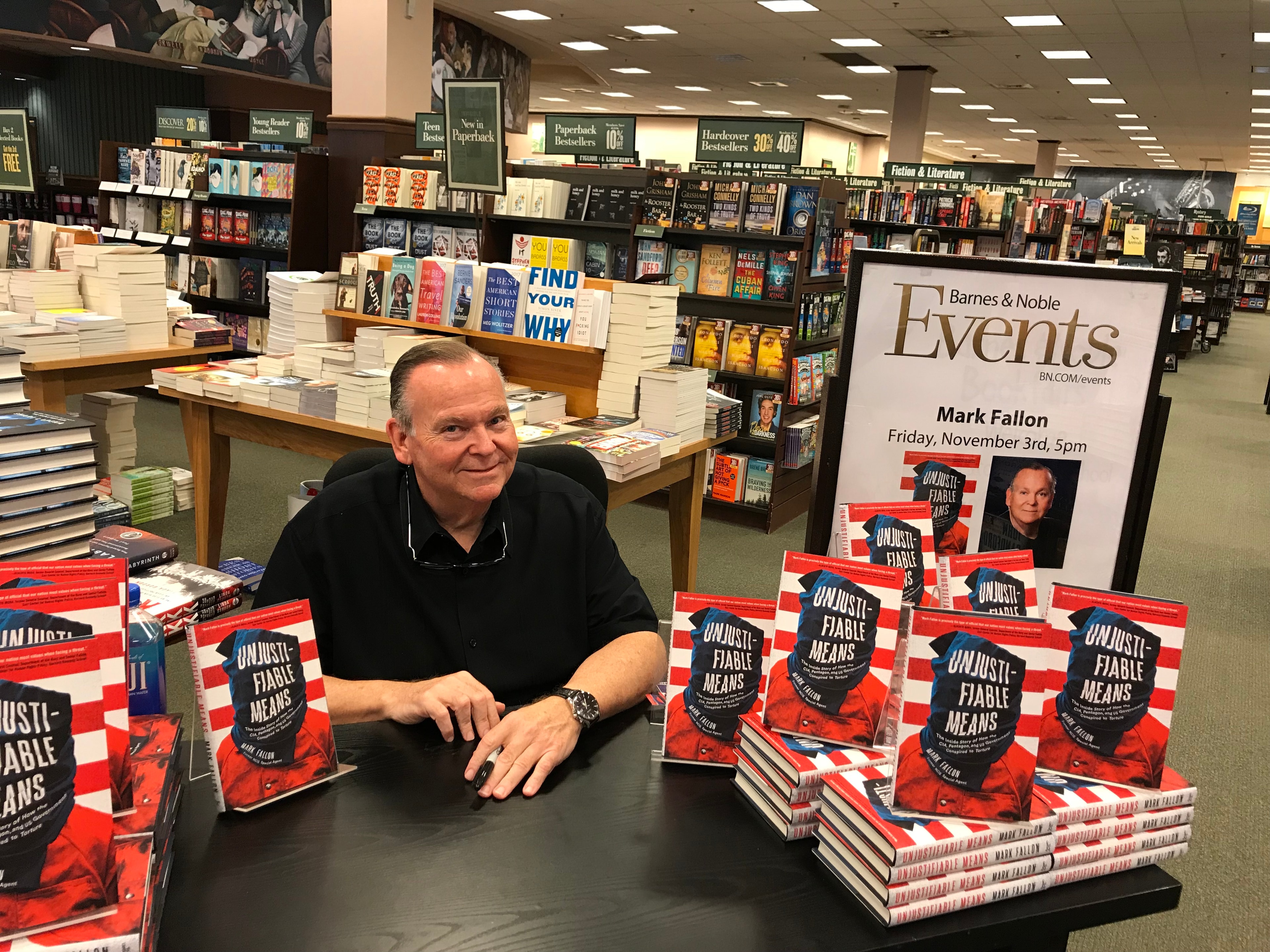 Copies of Unjustifiable Means on display at a bookstore