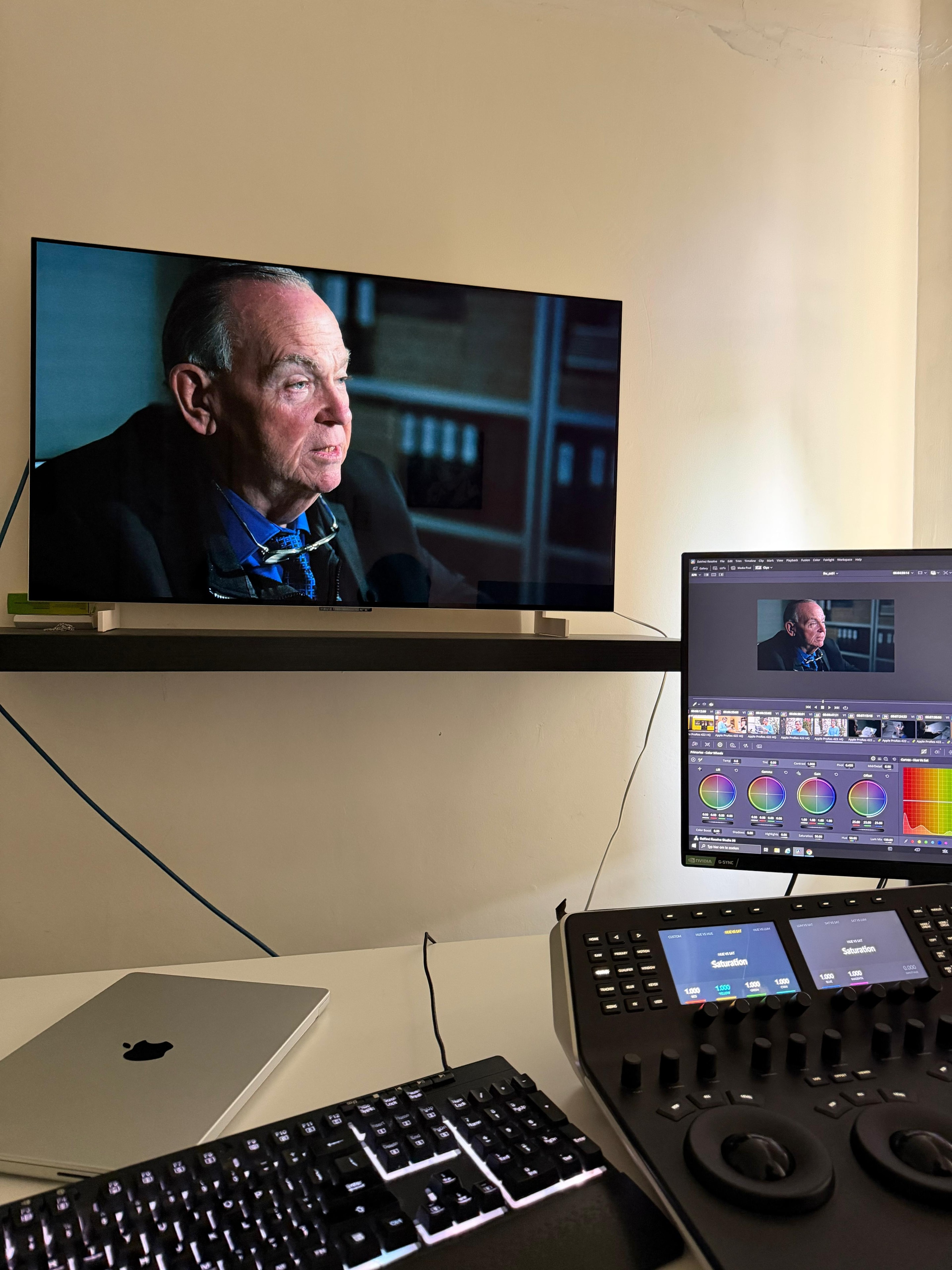 Mark Fallon on screen in a professional video editing suite