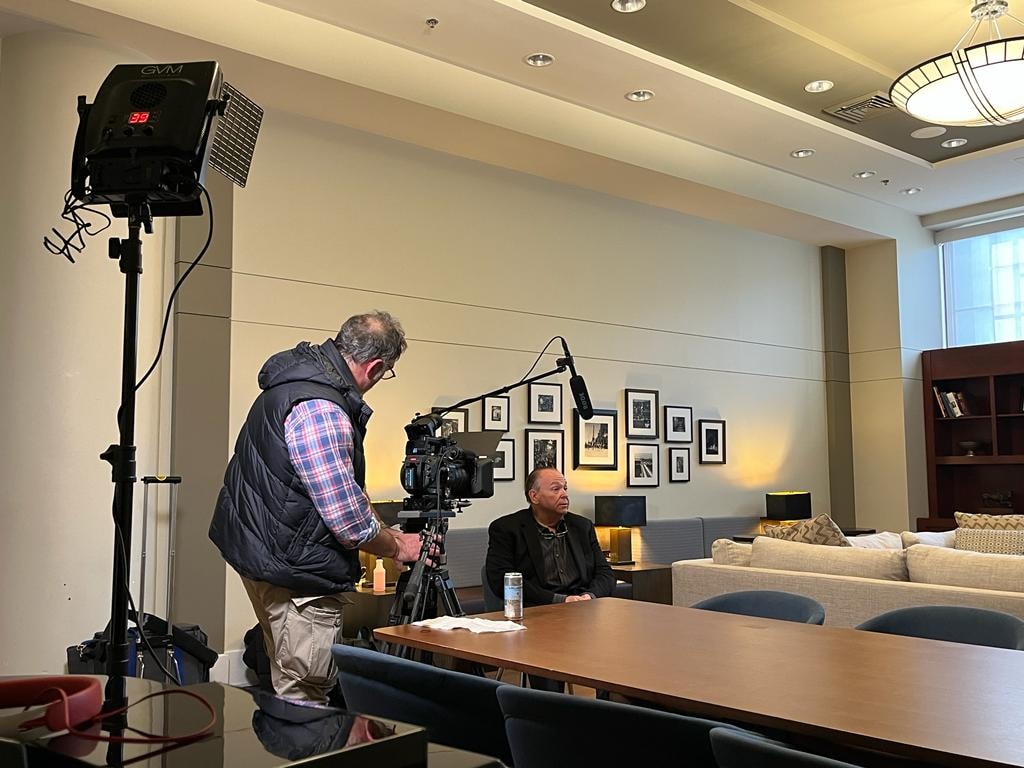 Film crew setting up for a documentary interview with Mark Fallon